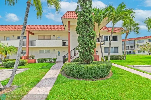 a view of building with garden