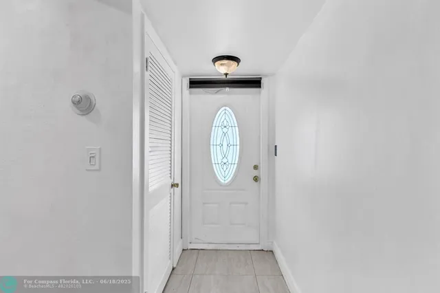 a view of a hallway with elevator