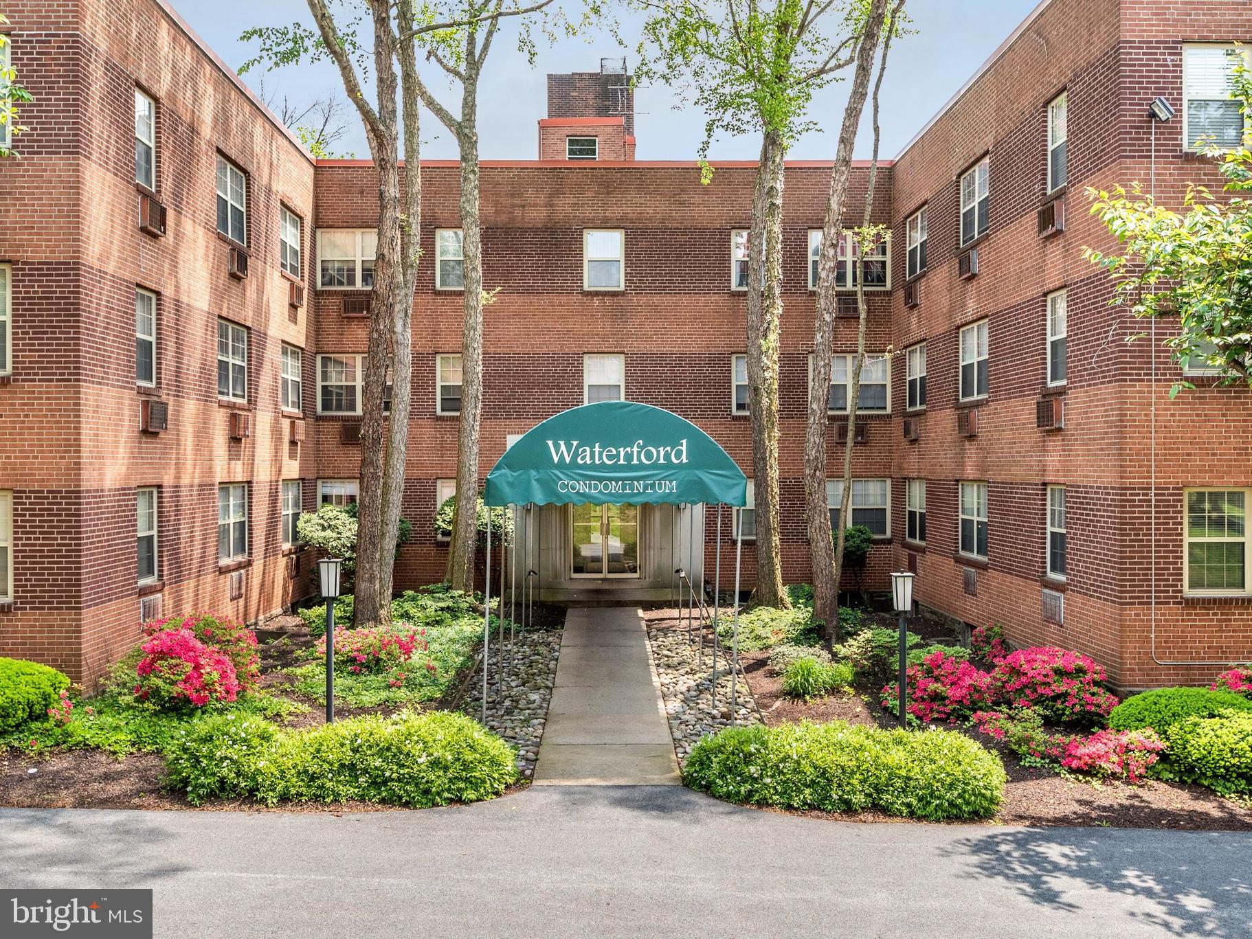 383 Lakeside Road, Unit 105 Ardmore, PA 19003 - Photo 1 of 25 a view of a building and a street