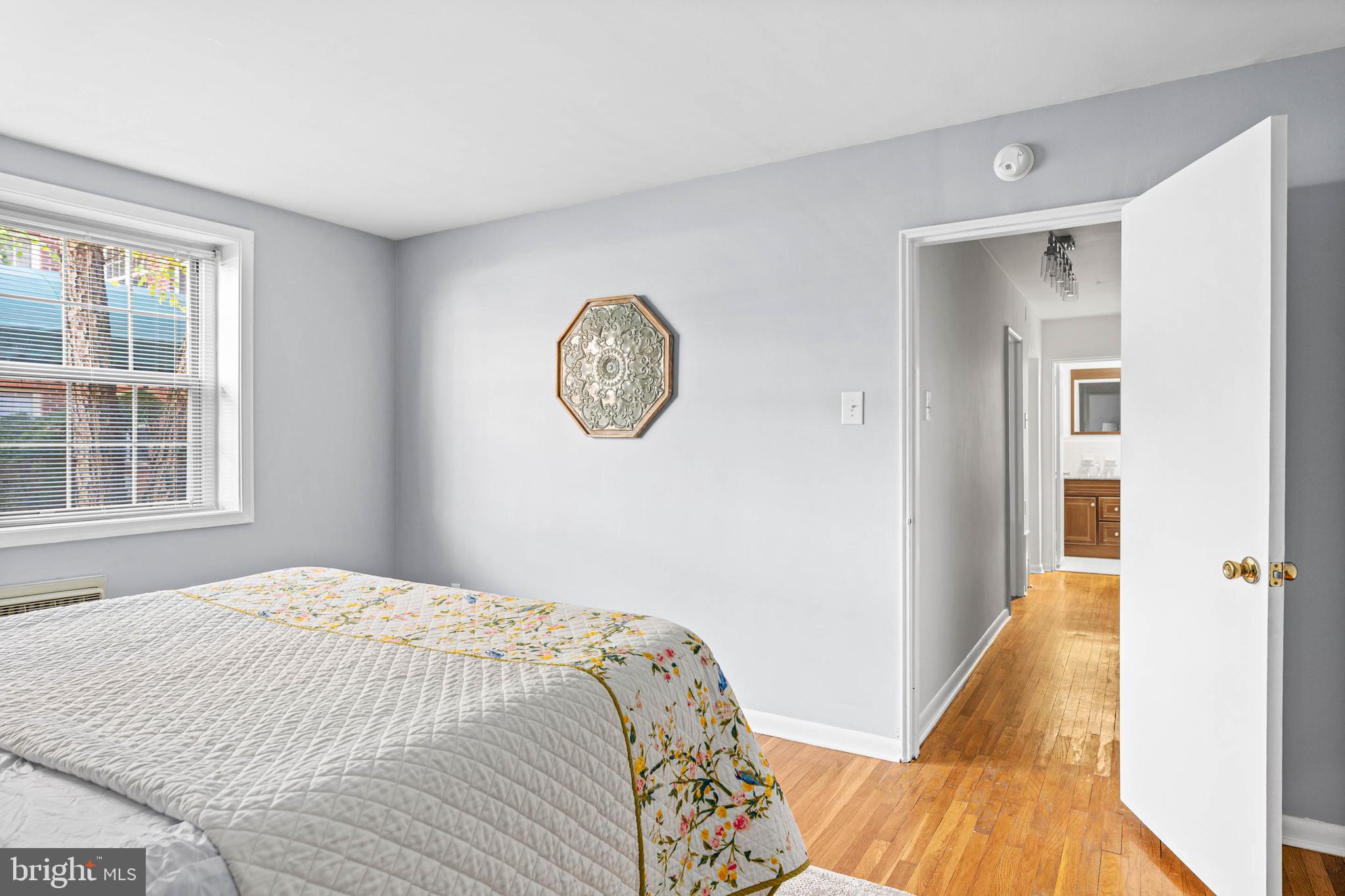 383 Lakeside Road, Unit 105 Ardmore, PA 19003 - Photo 13 of 25 a bedroom with a bed and a window