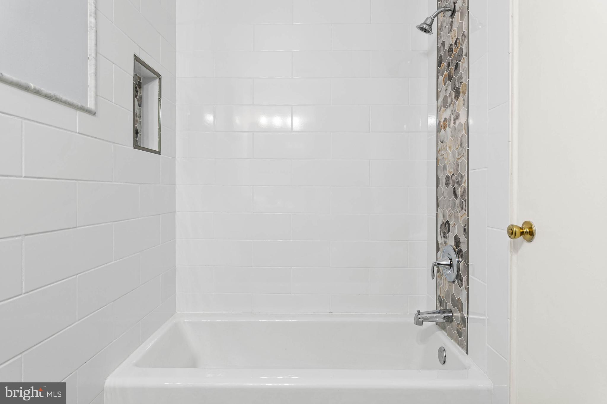 383 Lakeside Road, Unit 105 Ardmore, PA 19003 - Photo 15 of 25 a bathroom with a bathtub