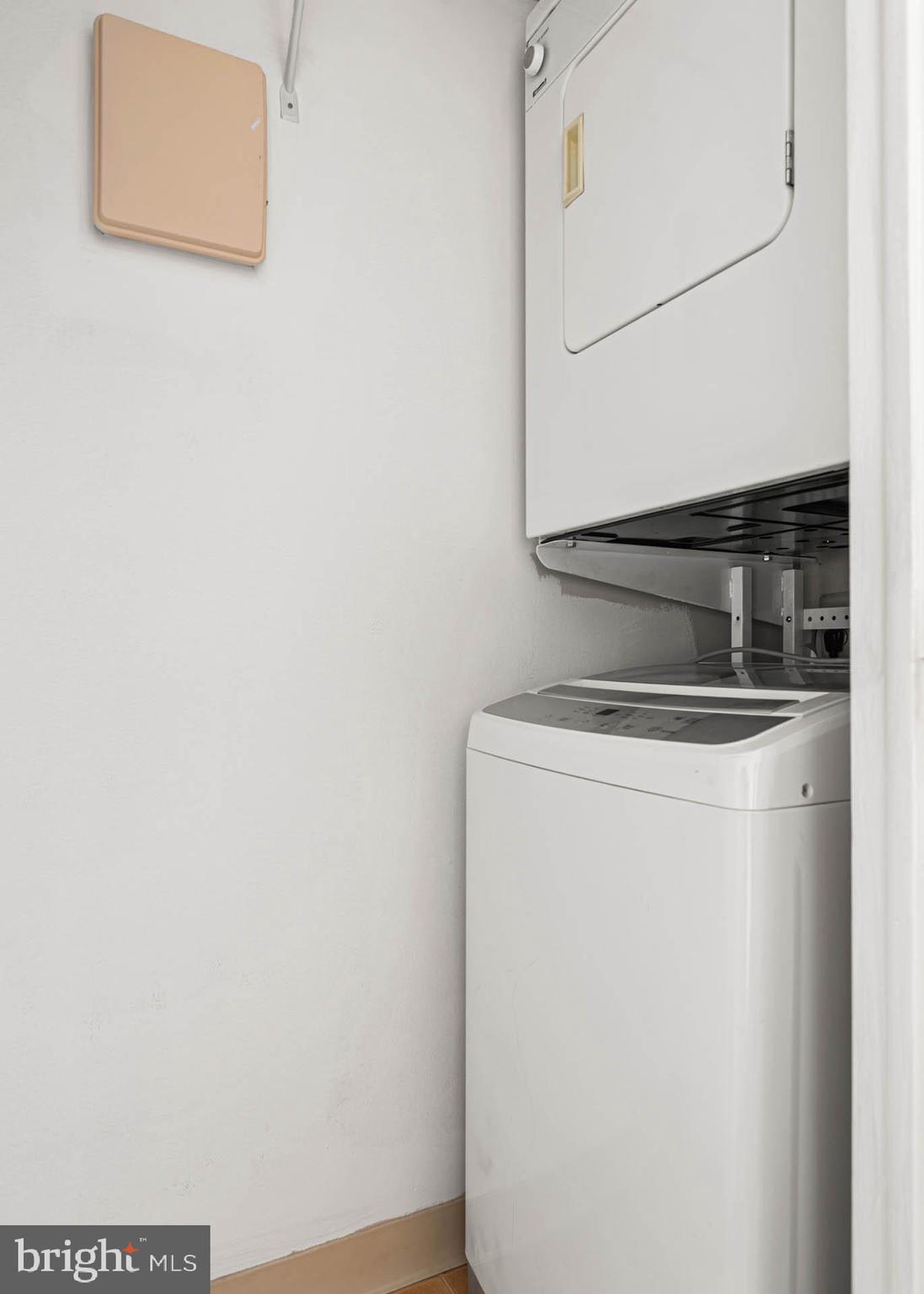 383 Lakeside Road, Unit 105 Ardmore, PA 19003 - Photo 19 of 25 a utility room with dryer and washer