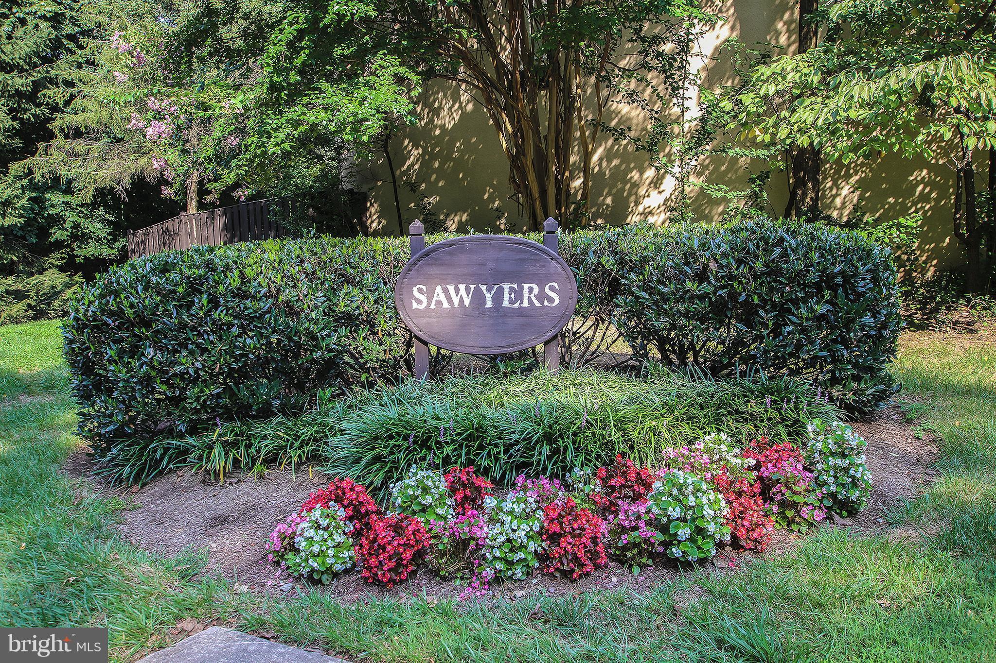 2203 Coppersmith Square Reston, VA 20191 - Photo 21 of 25 a view of a bunch of flowers and trees