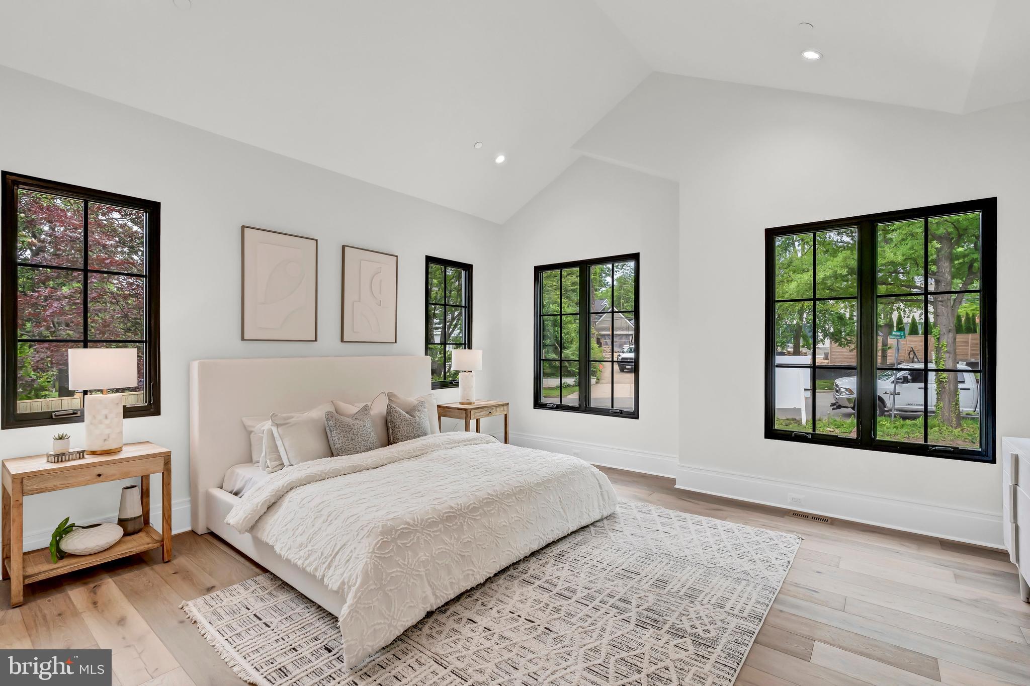 5425 Moorland Lane Bethesda, MD 20814 - Photo 27 of 79 a bedroom with a large bed and a window