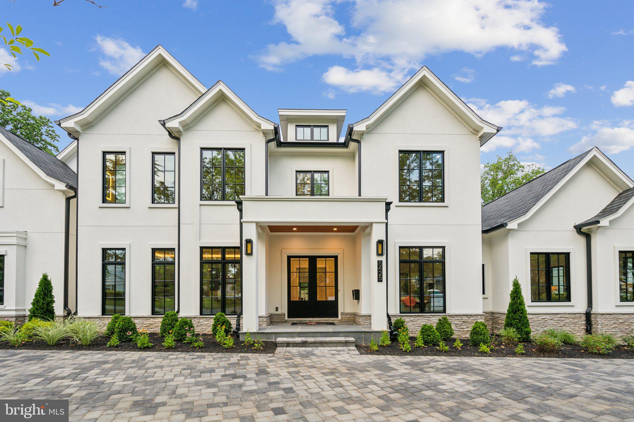 5425 Moorland Lane Bethesda, MD 20814 - Photo 3 of 79 a front view of a house with garden