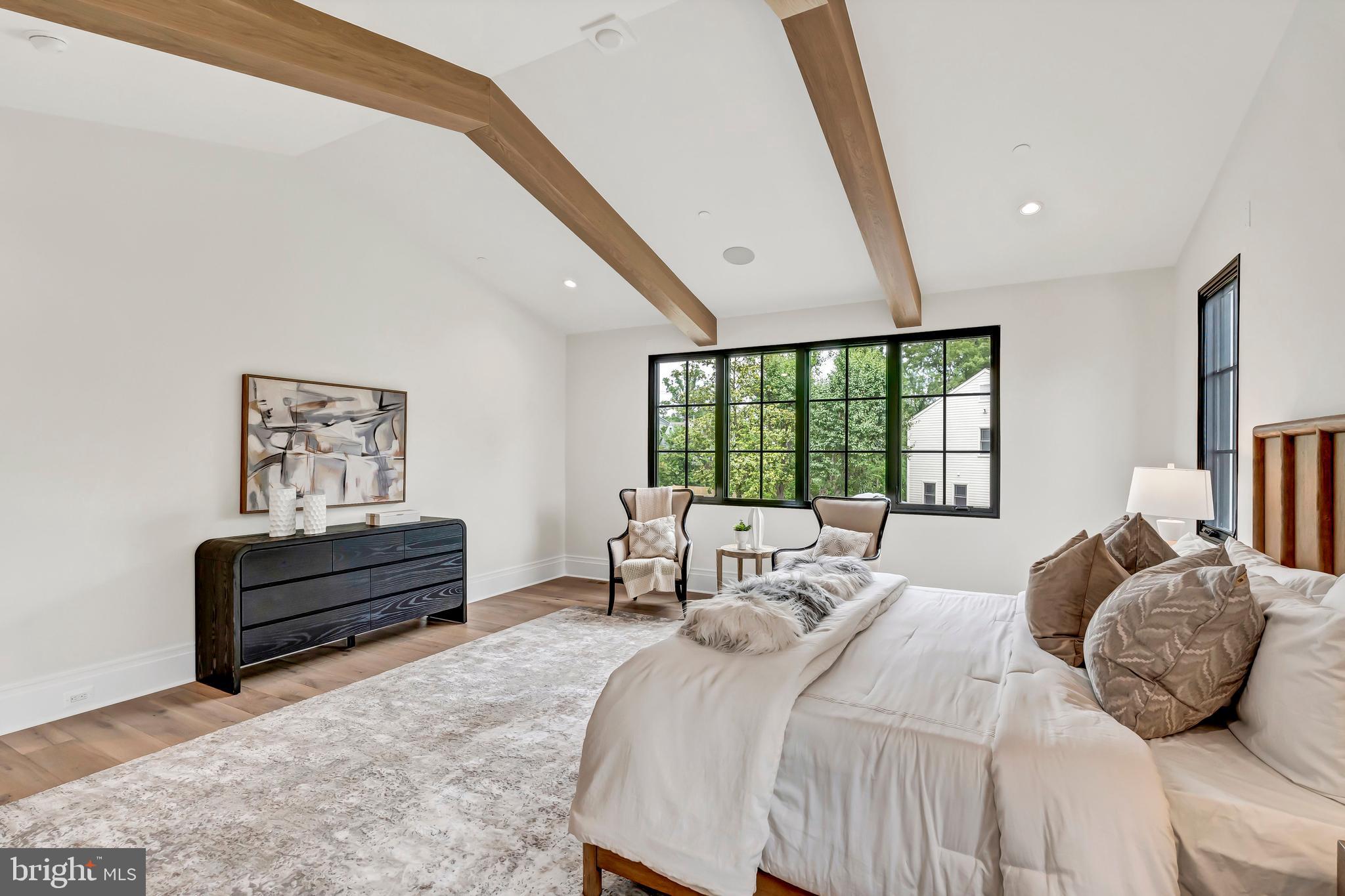 5425 Moorland Lane Bethesda, MD 20814 - Photo 39 of 79 a bedroom with a bed and a large window