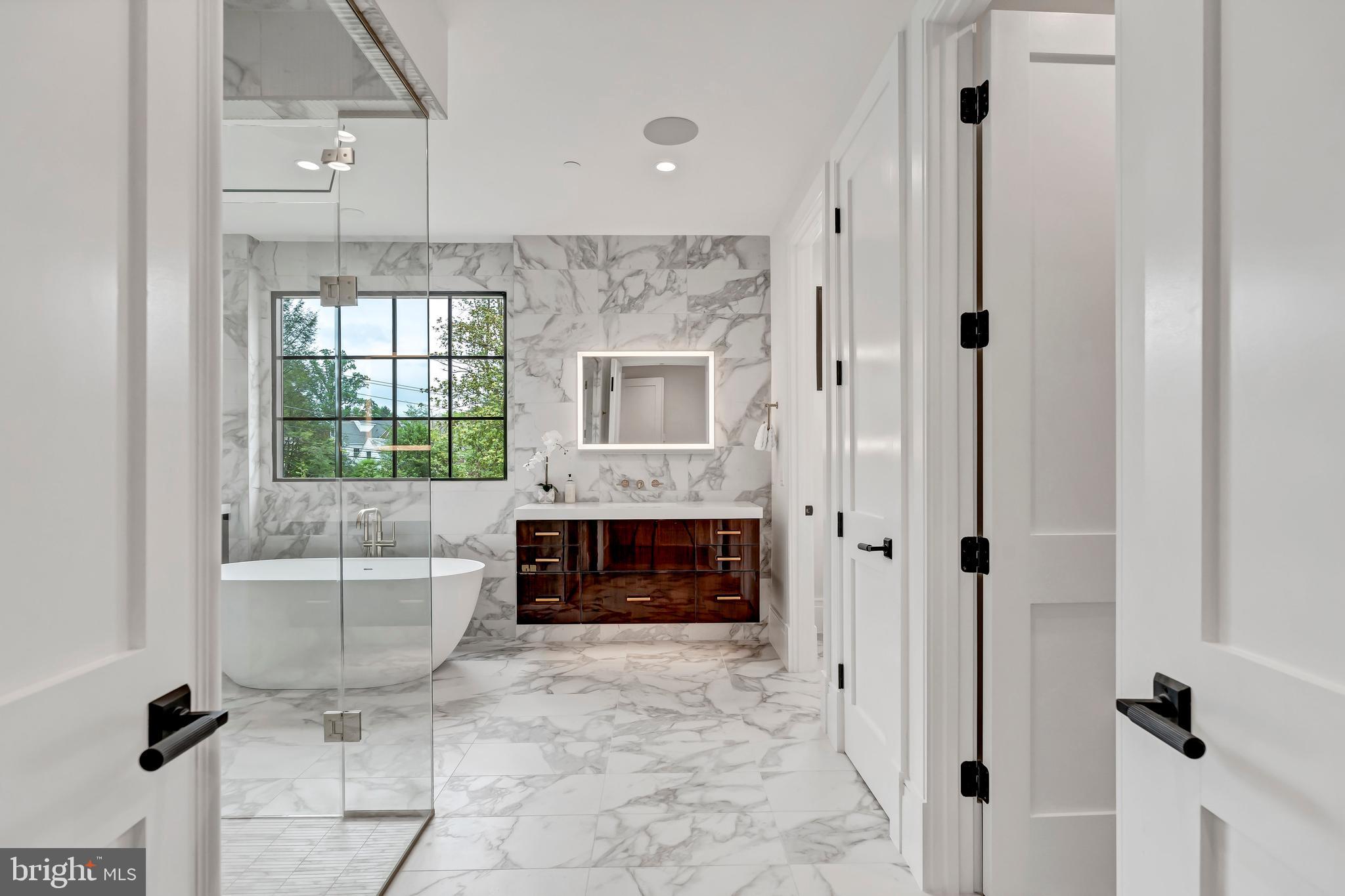 5425 Moorland Lane Bethesda, MD 20814 - Photo 40 of 79 a living room with furniture a window and a fireplace