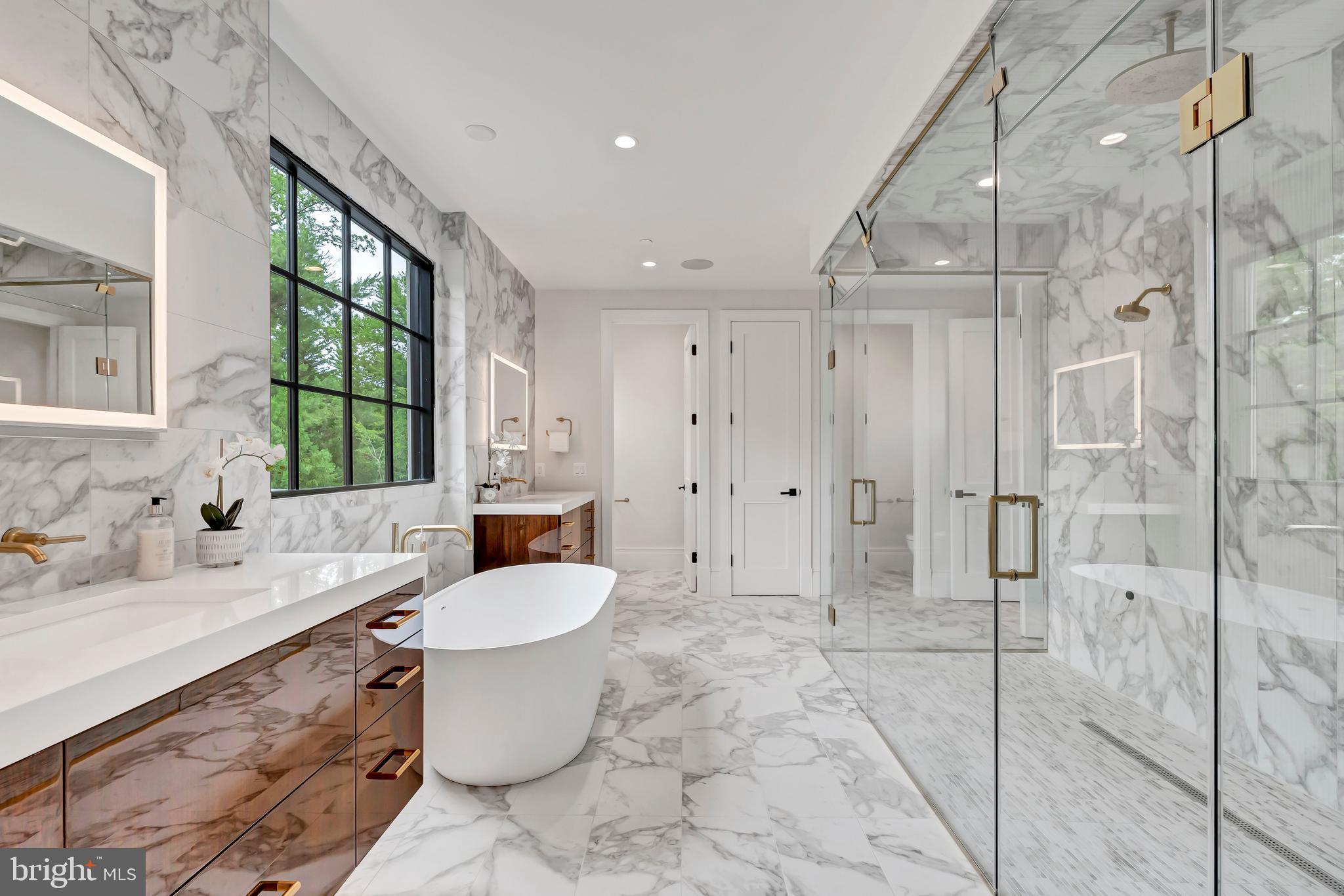5425 Moorland Lane Bethesda, MD 20814 - Photo 41 of 79 a bathroom with a sink toilet and shower