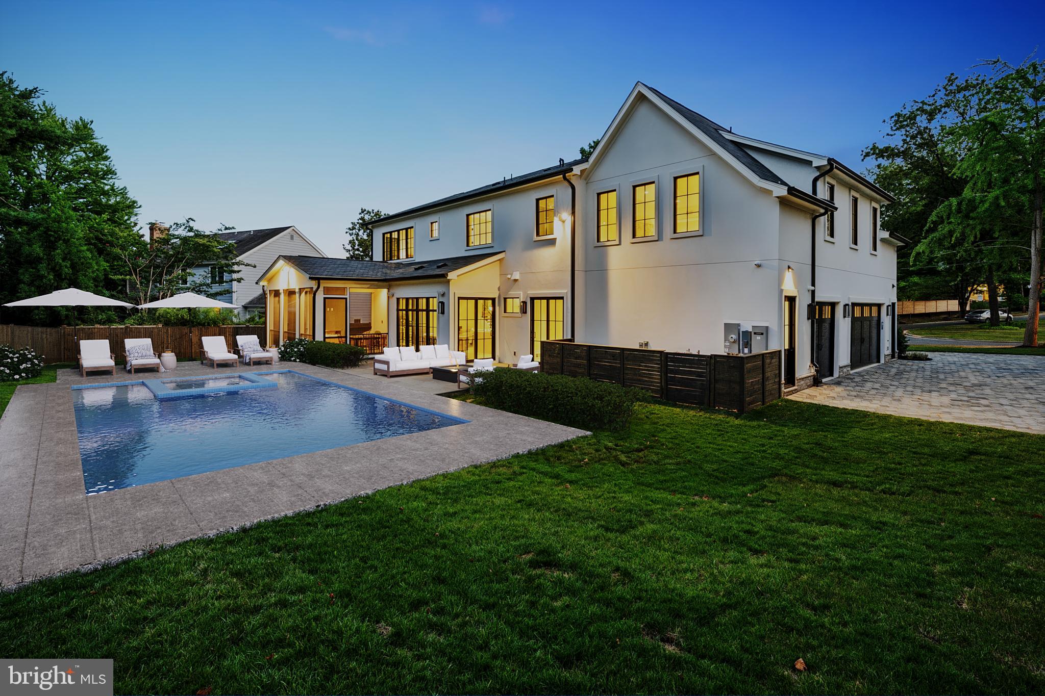5425 Moorland Lane Bethesda, MD 20814 - Photo 73 of 79 a front view of a house with garden and sitting area