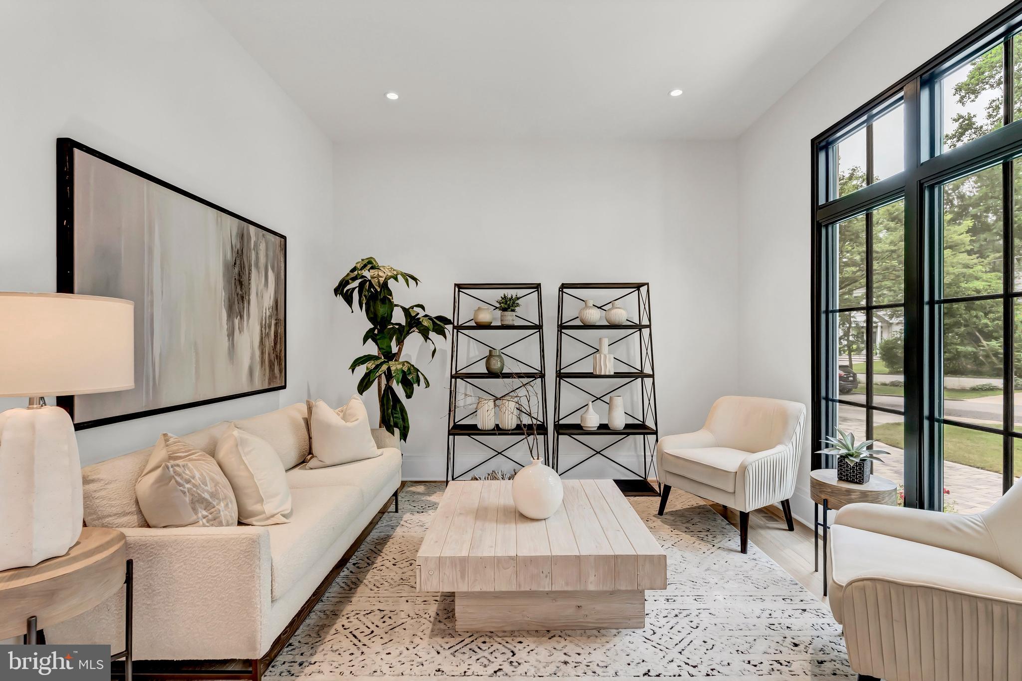 5425 Moorland Lane Bethesda, MD 20814 - Photo 8 of 79 a living room with furniture and a window