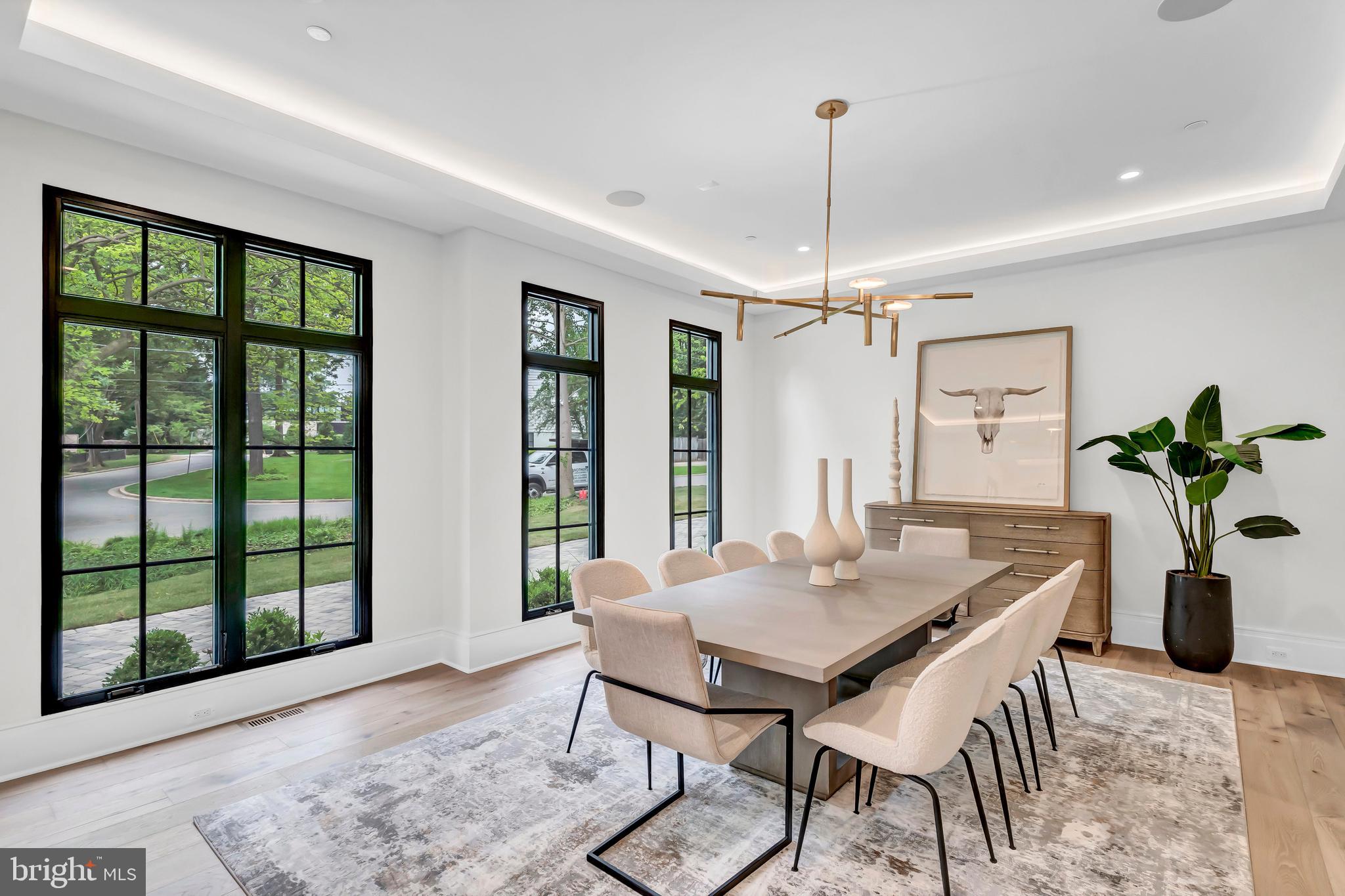5425 Moorland Lane Bethesda, MD 20814 - Photo 10 of 79 a view of a dining room with furniture window and wooden floor