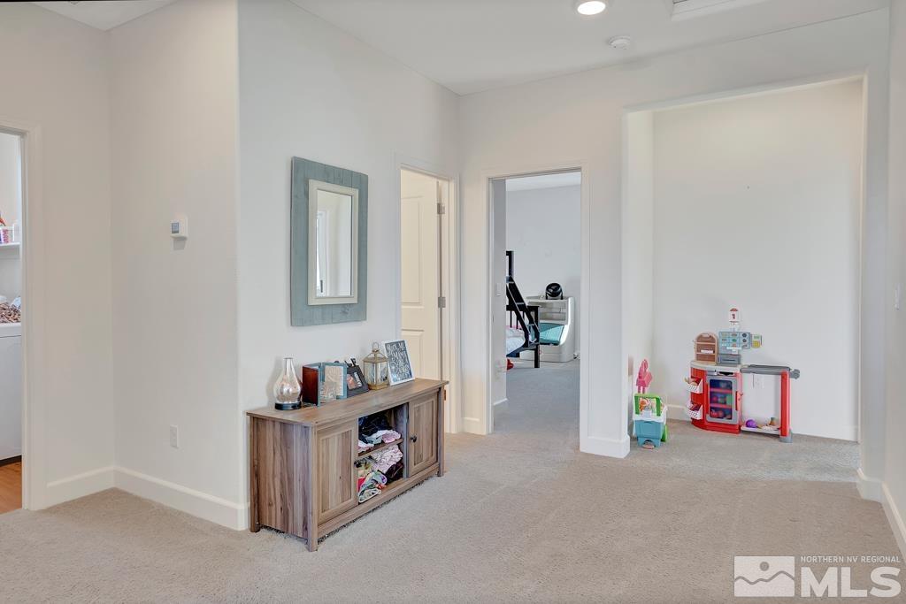 929 Estuary Circle Reno, NV 89506 - Photo 13 of 30 a view of storage and utility room with two washing machine