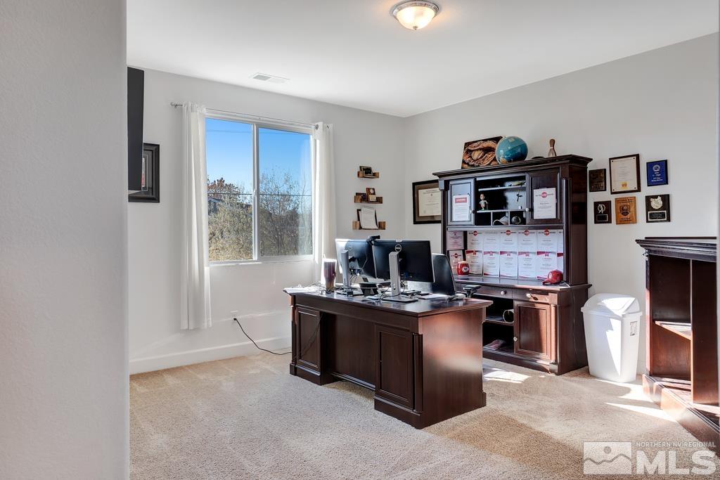 929 Estuary Circle Reno, NV 89506 - Photo 16 of 30 a view of a workspace with furniture and a window