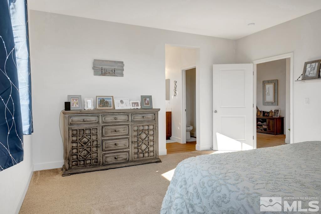 929 Estuary Circle Reno, NV 89506 - Photo 19 of 30 a view of a bedroom with furniture and cabinet