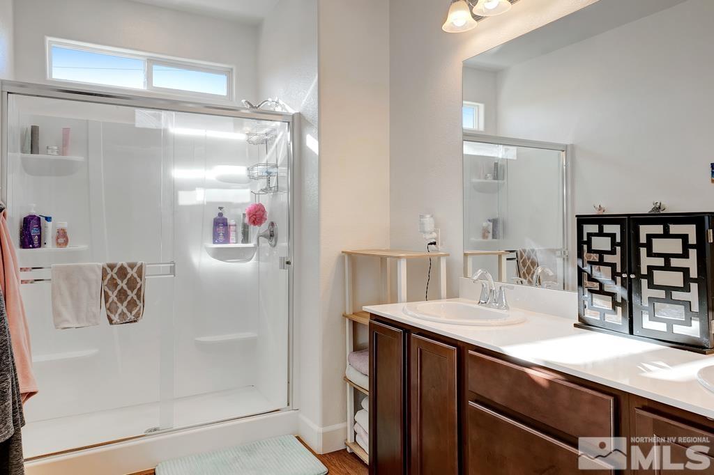 929 Estuary Circle Reno, NV 89506 - Photo 20 of 30 a bathroom with a sink vanity and a mirror