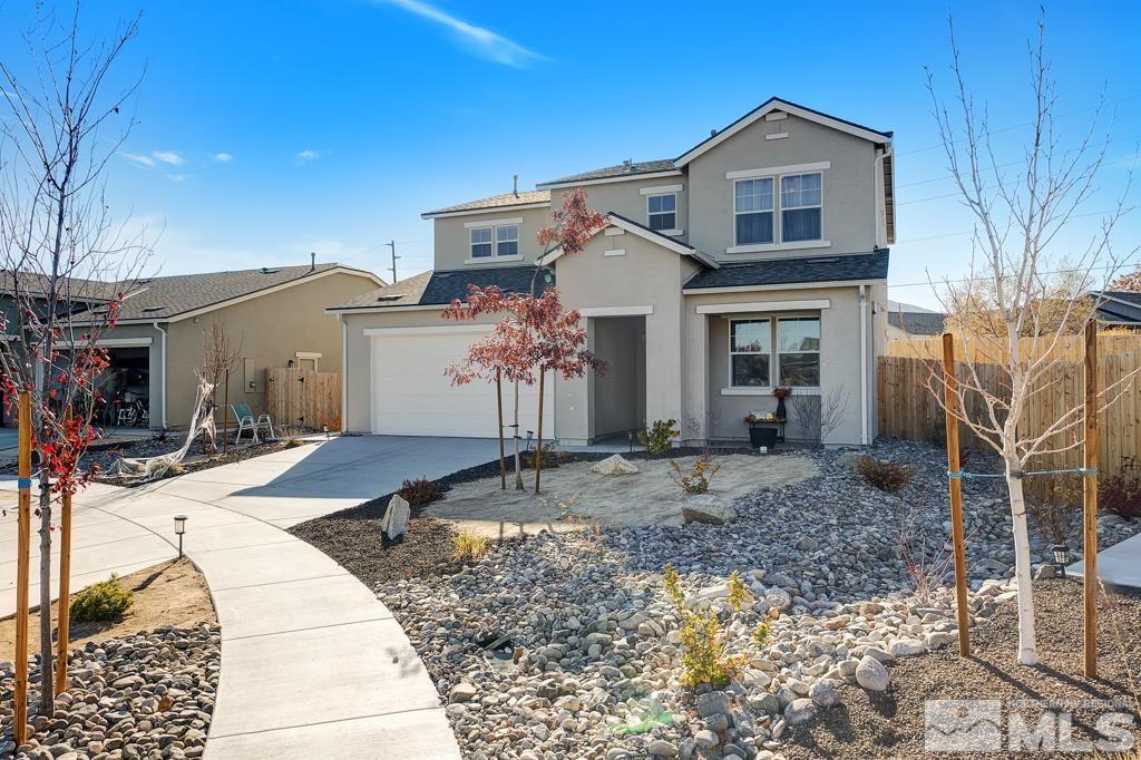 929 Estuary Circle Reno, NV 89506 - Photo 2 of 30 a front view of a house with garden