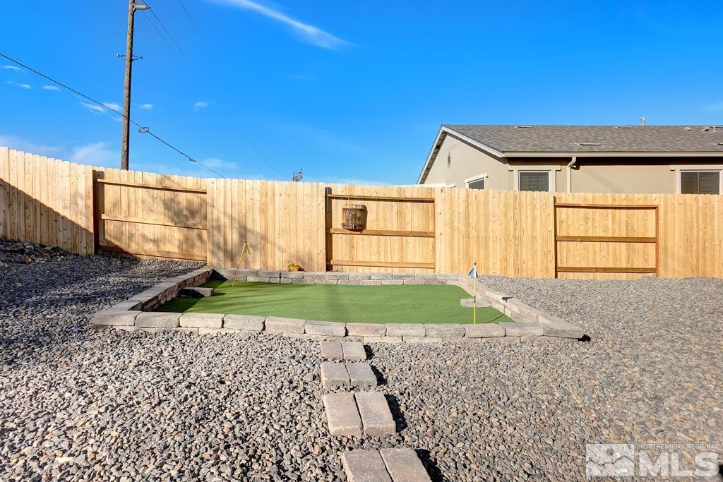 929 Estuary Circle Reno, NV 89506 - Photo 24 of 30 a view of backyard with plants
