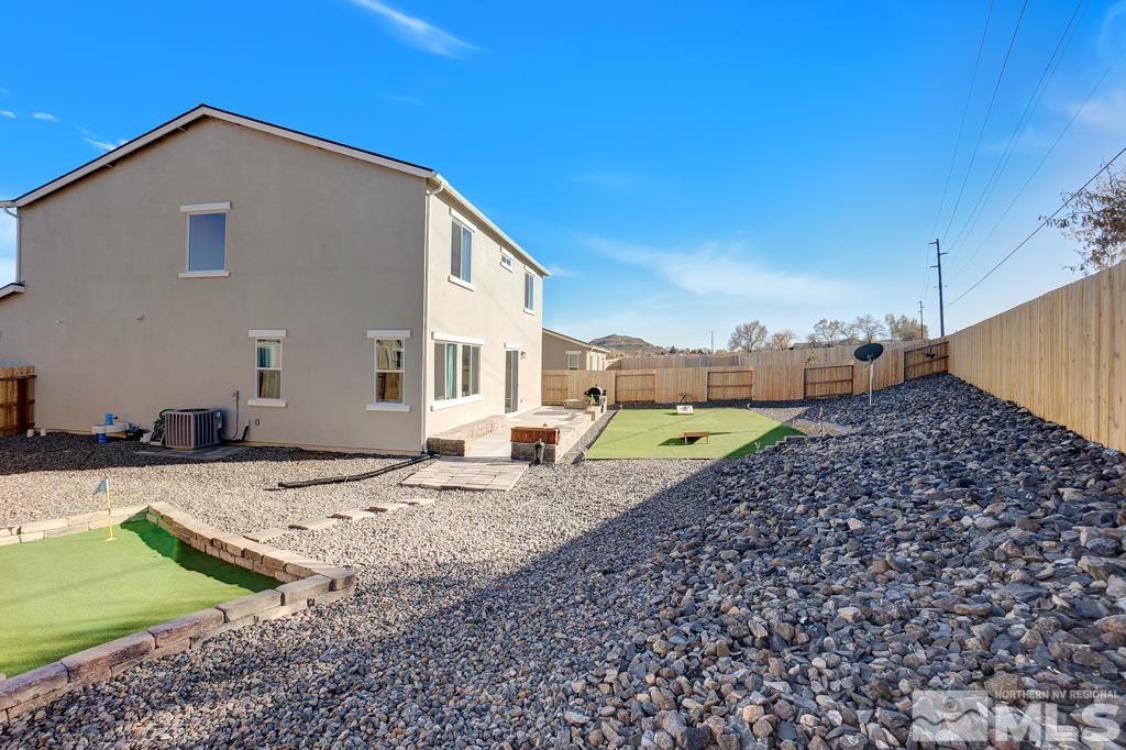 929 Estuary Circle Reno, NV 89506 - Photo 25 of 30 a view of a house with a backyard