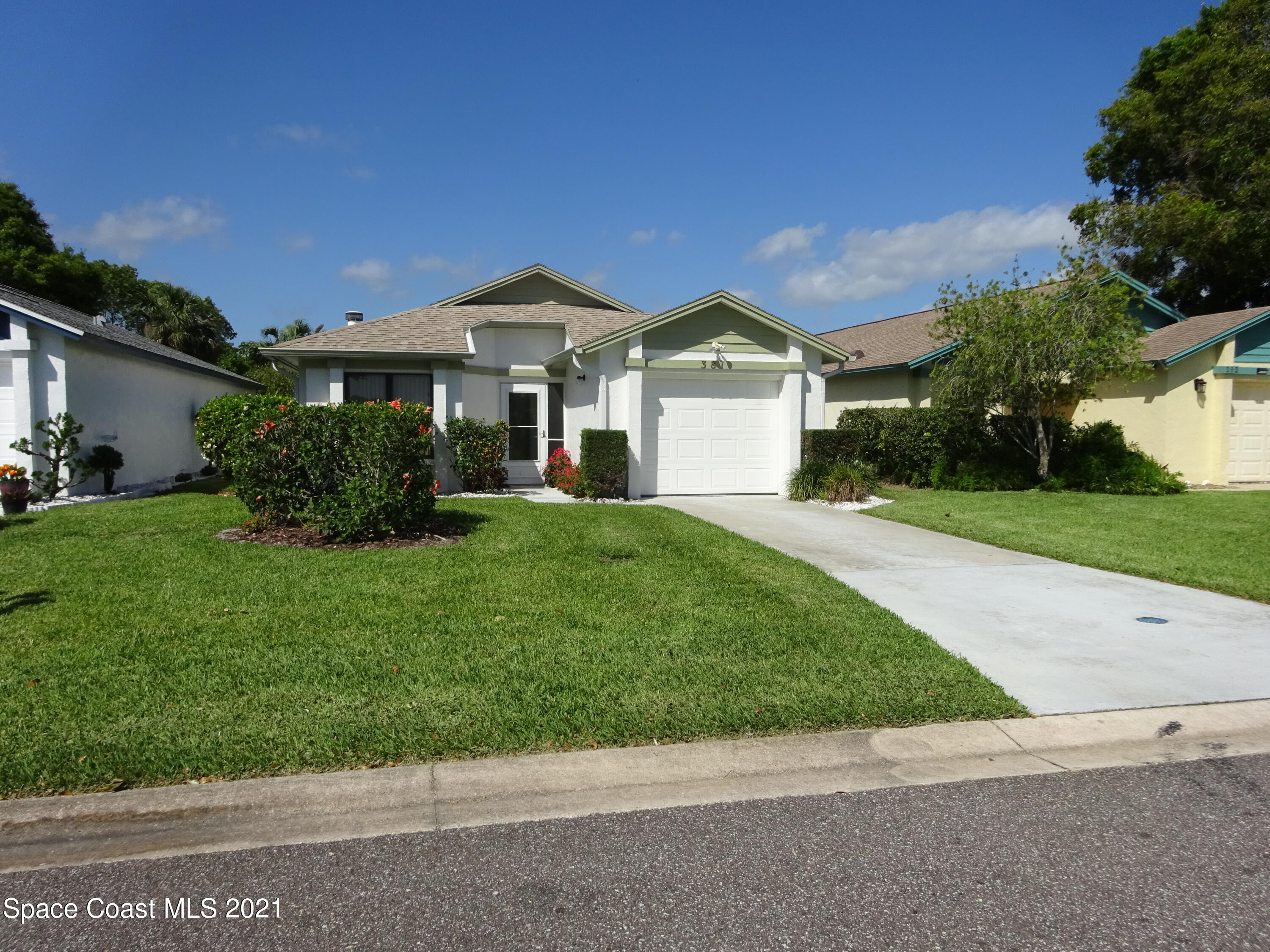 381 Myrtlewood Road Melbourne, FL 32940 - Photo 1 of 31 a front view of a house with garden