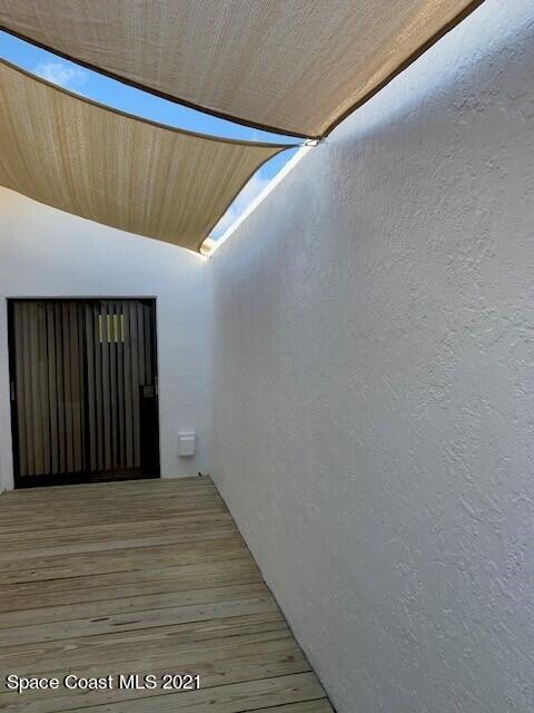 381 Myrtlewood Road Melbourne, FL 32940 - Photo 12 of 31 a view of a room with wooden walls