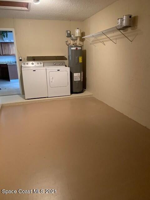 381 Myrtlewood Road Melbourne, FL 32940 - Photo 29 of 31 a view of a storage & utility room with washer and dryer