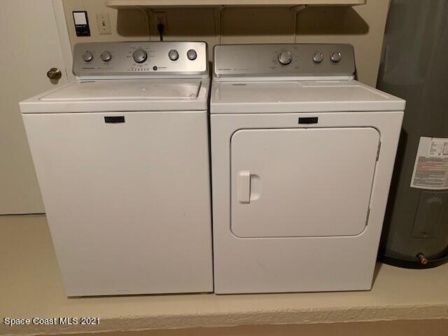 381 Myrtlewood Road Melbourne, FL 32940 - Photo 30 of 31 a close up view of washer and dryer