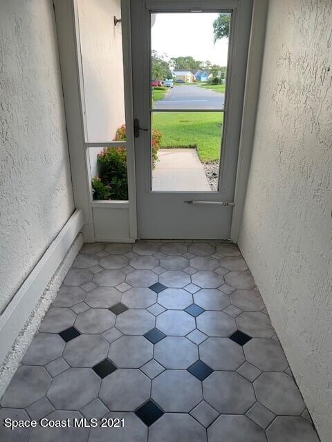 381 Myrtlewood Road Melbourne, FL 32940 - Photo 6 of 31 a view of an empty room with a window
