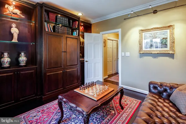 a living room with furniture and a table