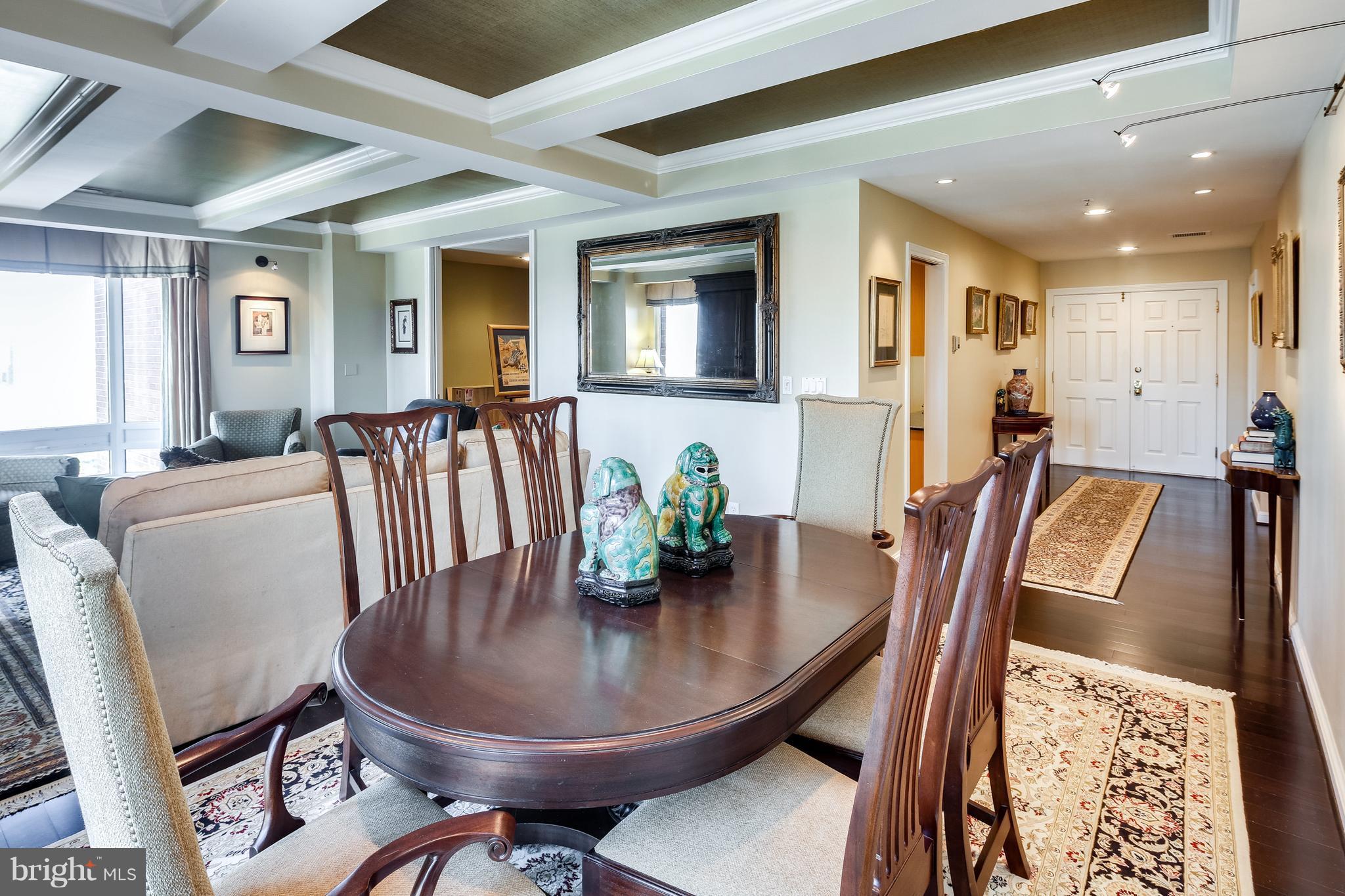 10 East Lee Street, Unit 1802 Baltimore, MD 21202 - Photo 4 of 21 a view of a dining room with furniture