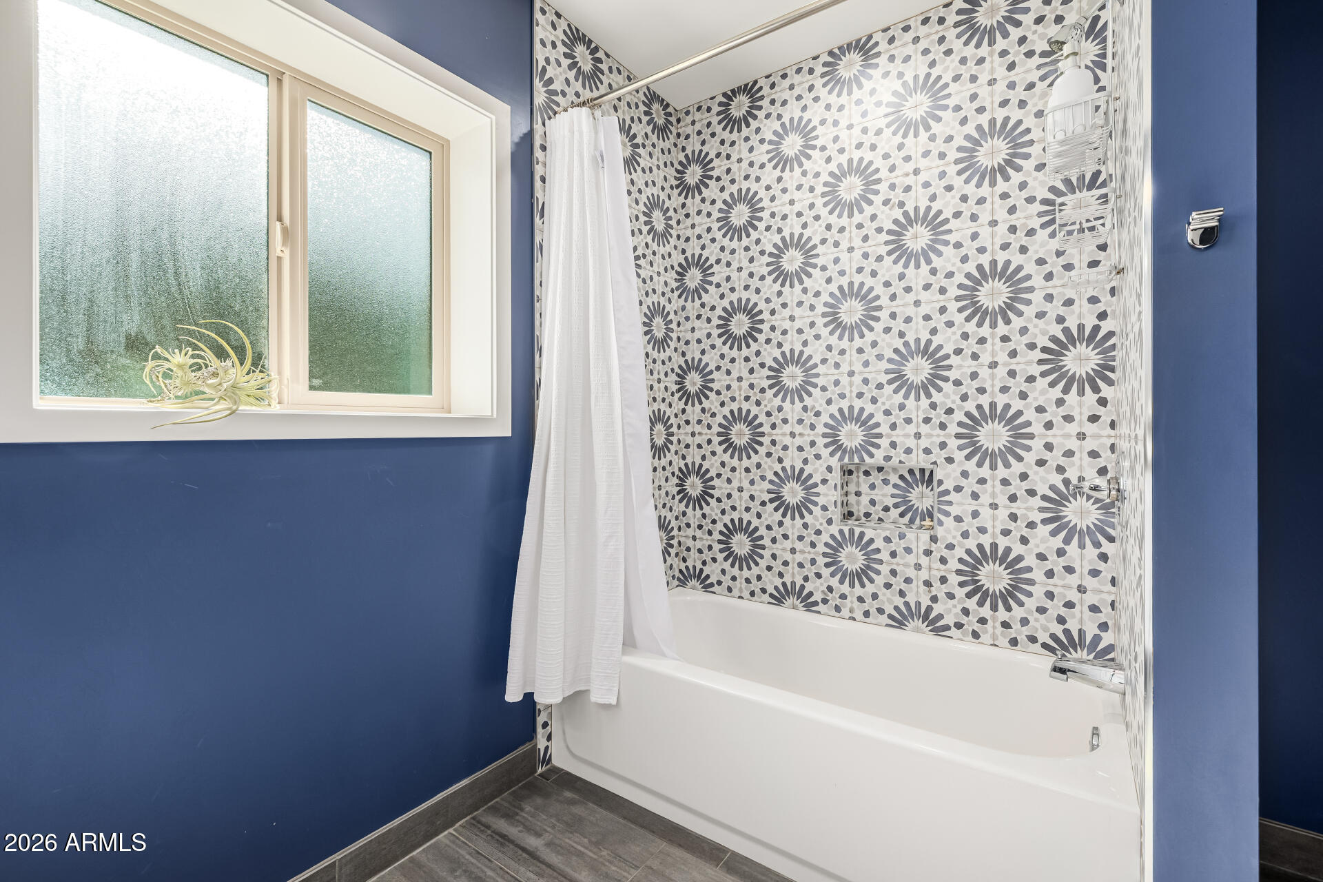 6726 North 11th Street Phoenix, AZ 85014 - Photo 35 of 49 a bathroom with a bathtub and shower