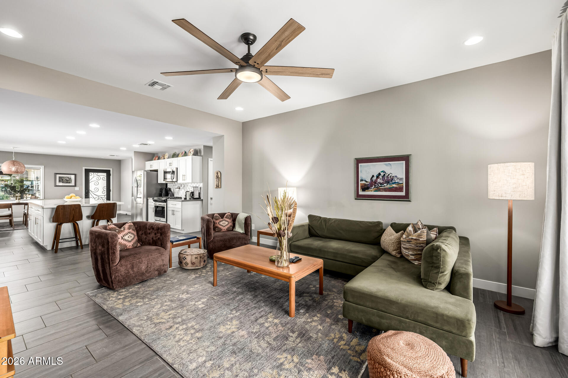 6726 North 11th Street Phoenix, AZ 85014 - Photo 8 of 49 a living room with furniture a view of bedroom and a window