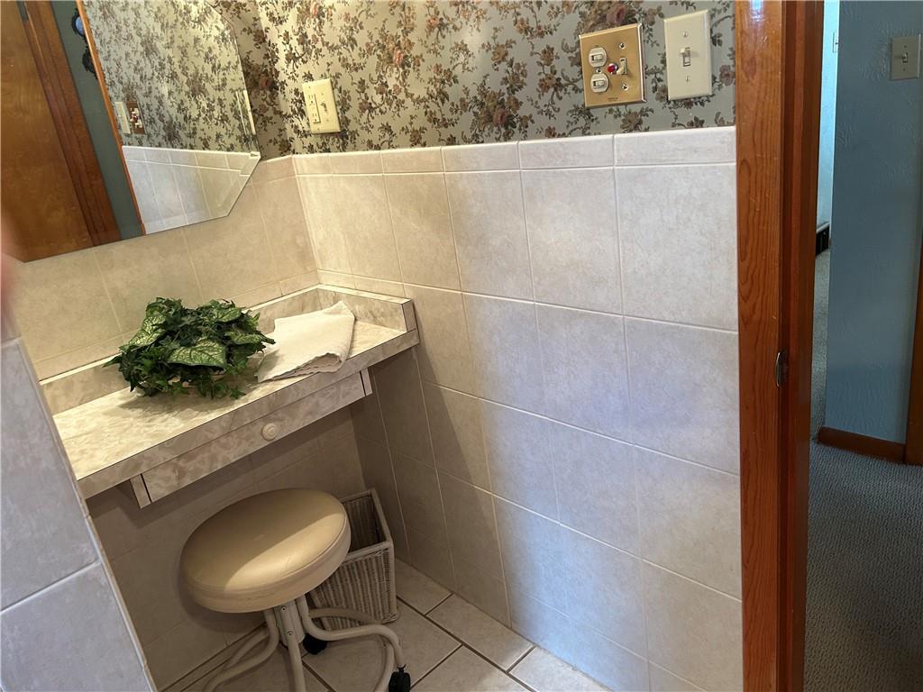 356 3rd Street Smithton, PA 15479 - Photo 15 of 21 a bathroom with a sink and a toilet