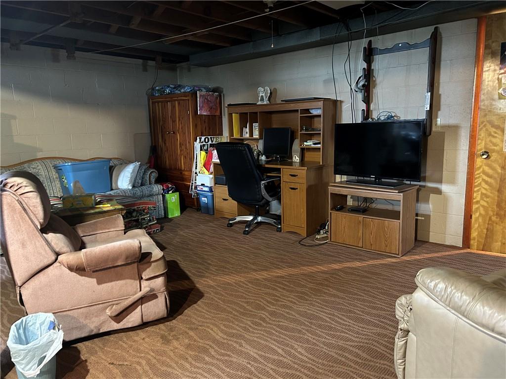 356 3rd Street Smithton, PA 15479 - Photo 18 of 21 a living room with furniture and a flat screen tv