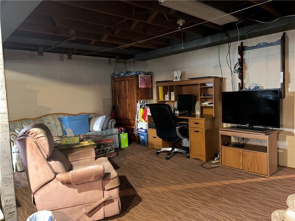356 3rd Street Smithton, PA 15479 - Photo 19 of 21 a living room with furniture and a flat screen tv