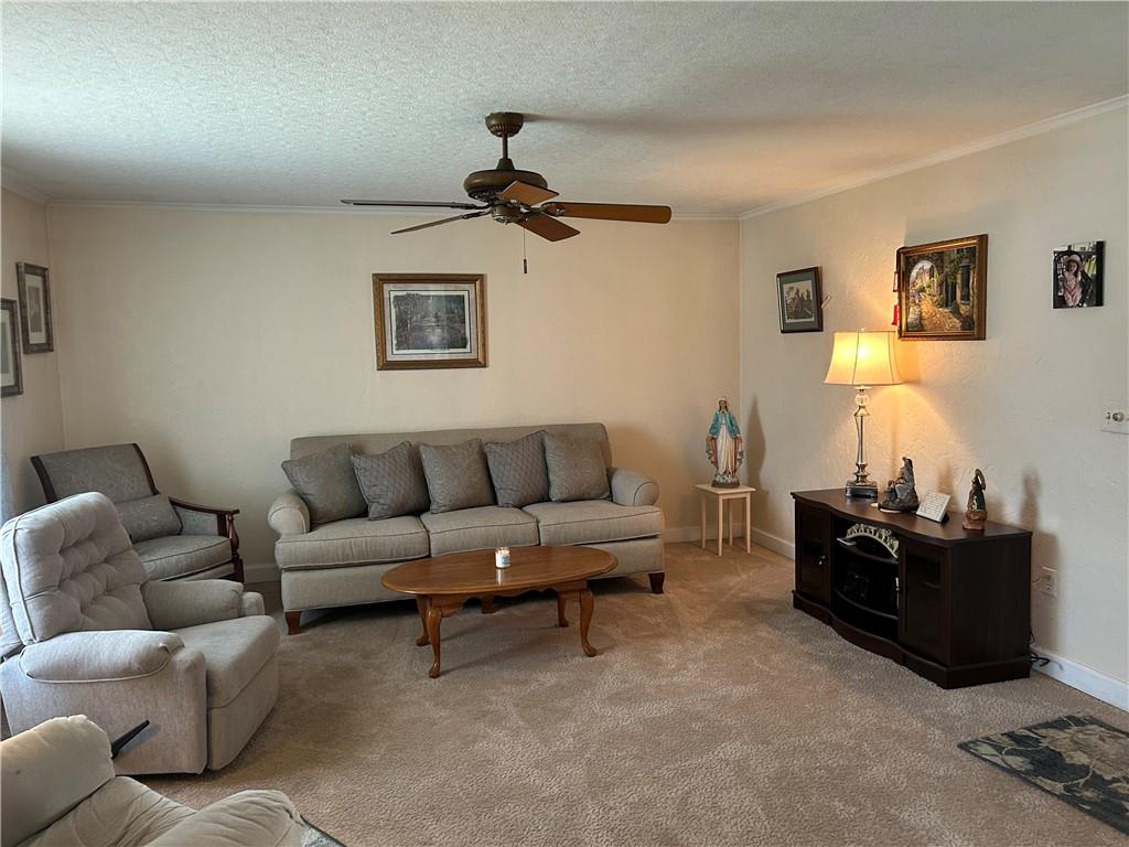 356 3rd Street Smithton, PA 15479 - Photo 7 of 21 a living room with furniture and a flat screen tv
