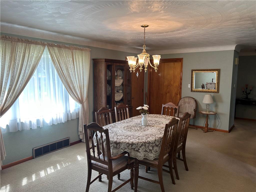 356 3rd Street Smithton, PA 15479 - Photo 8 of 21 a view of a dining room with furniture window and outside view