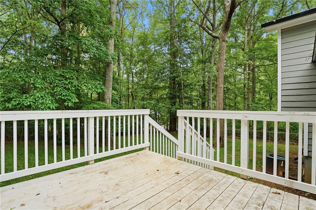 404 Brooks Street Dallas, GA 30157 - Photo 28 of 38 a view of balcony with wooden floor