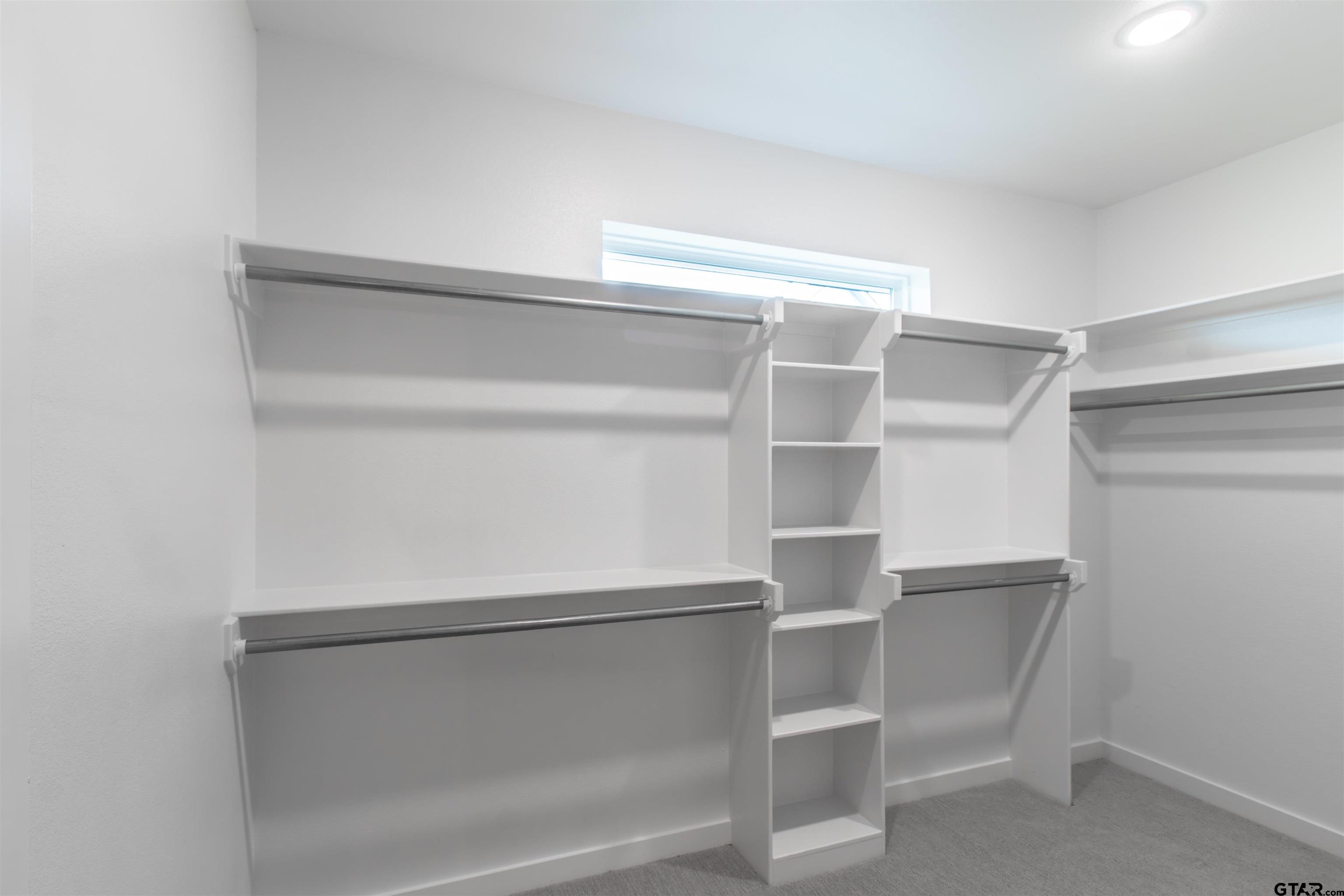 7013 Hillside Avenue Tyler, TX 75707 - Photo 28 of 37 a view of an empty walk in closet