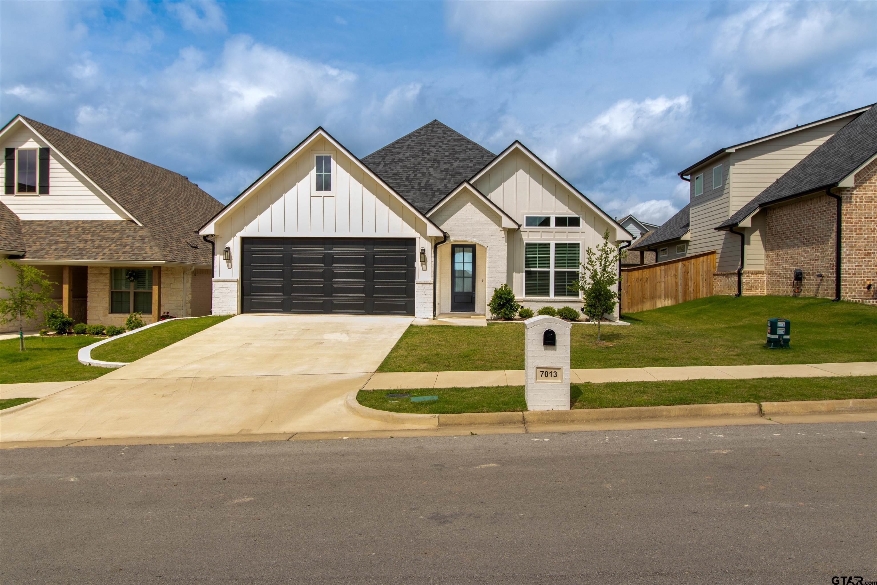 7013 Hillside Avenue Tyler, TX 75707 - Photo 35 of 37 a view of house with yard and large tree