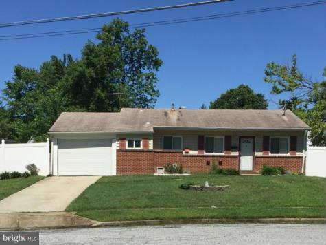 6224 Auth Road Suitland, MD 20746 - Photo 1 of 14 a front view of house with a garden