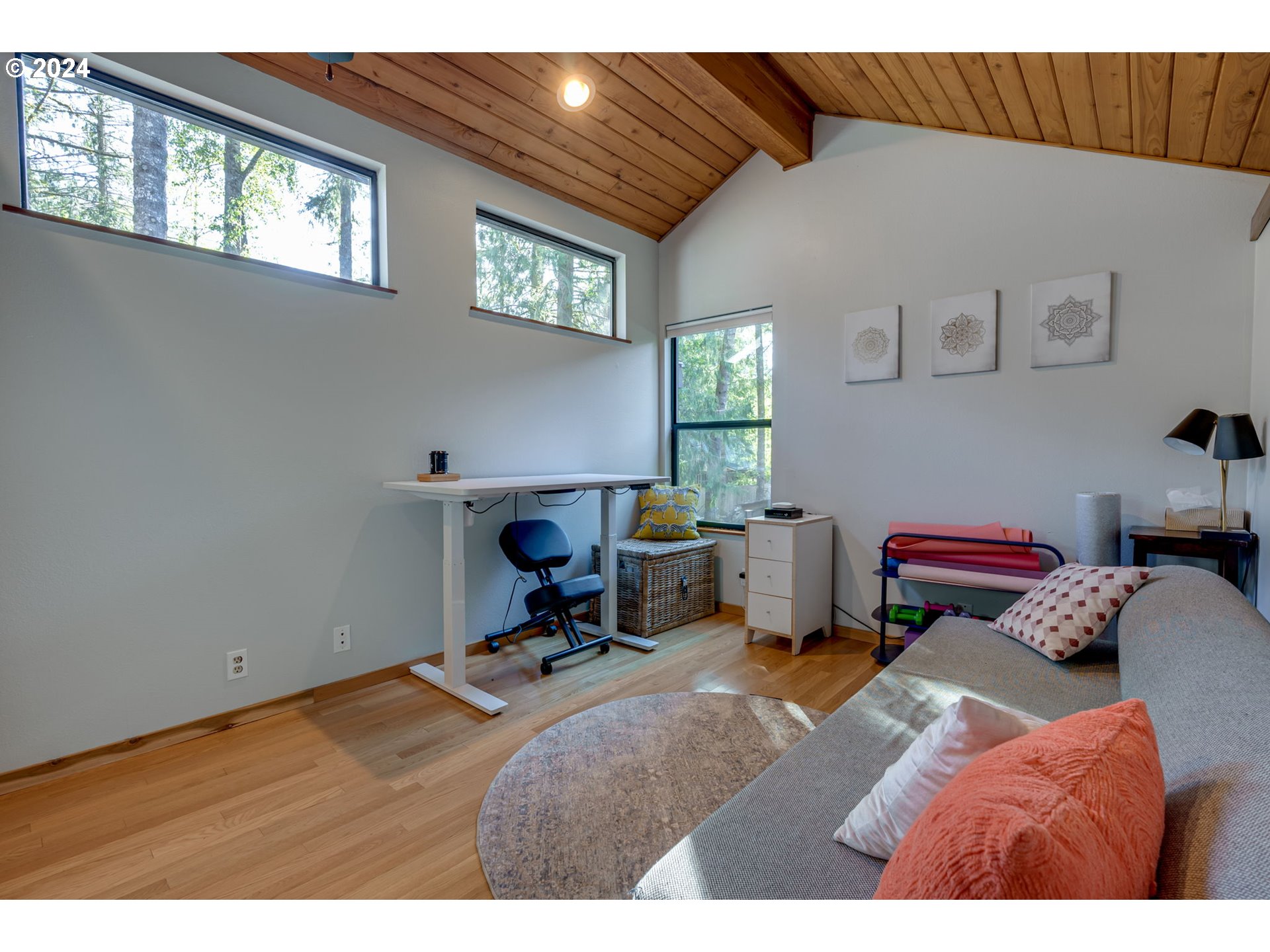 65377 East Sandy River Lane Rhododendron, OR 97049 - Photo 19 of 40 a bed room with a bed and a window