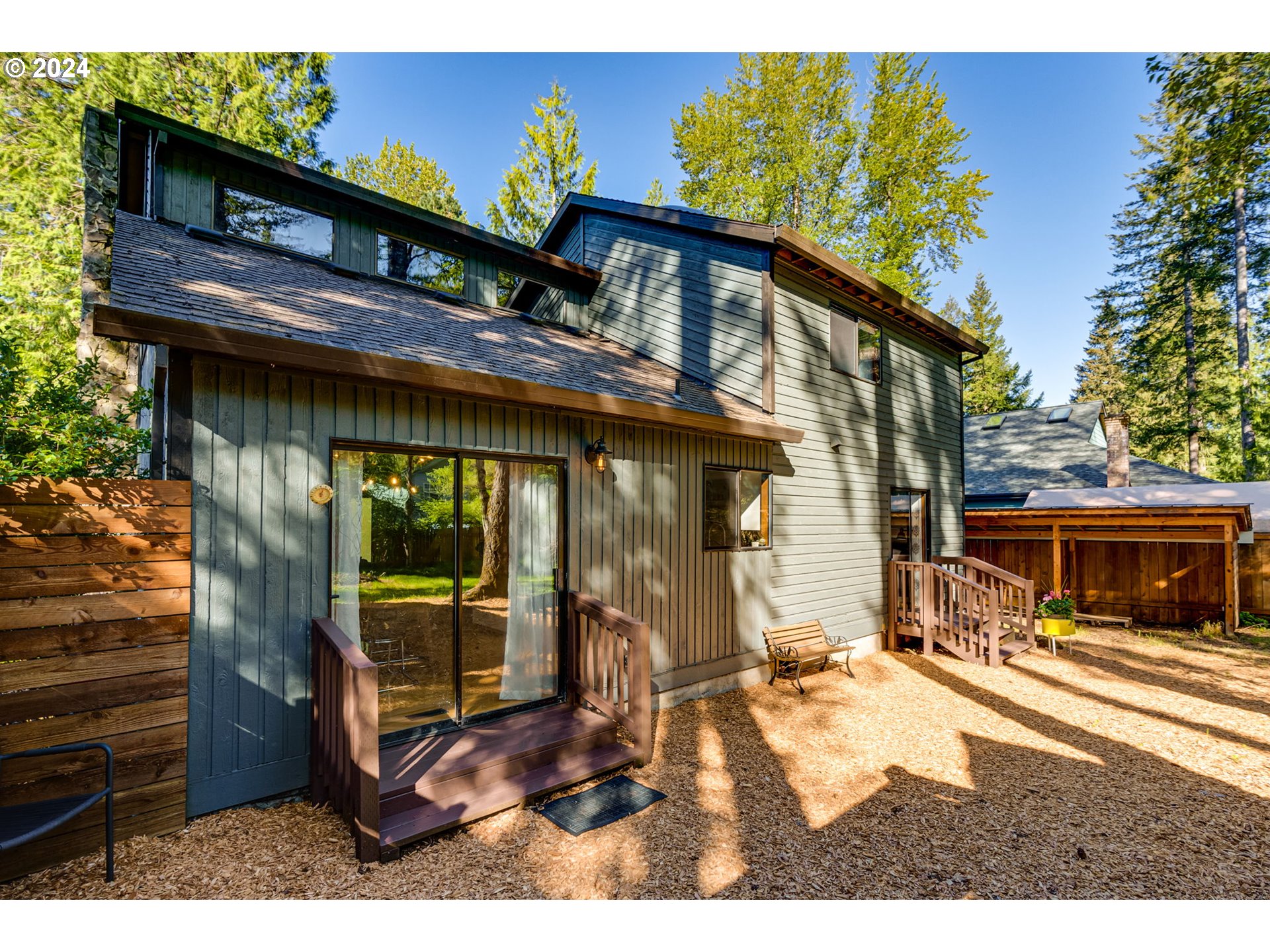 65377 East Sandy River Lane Rhododendron, OR 97049 - Photo 29 of 40 a view of a house with a patio