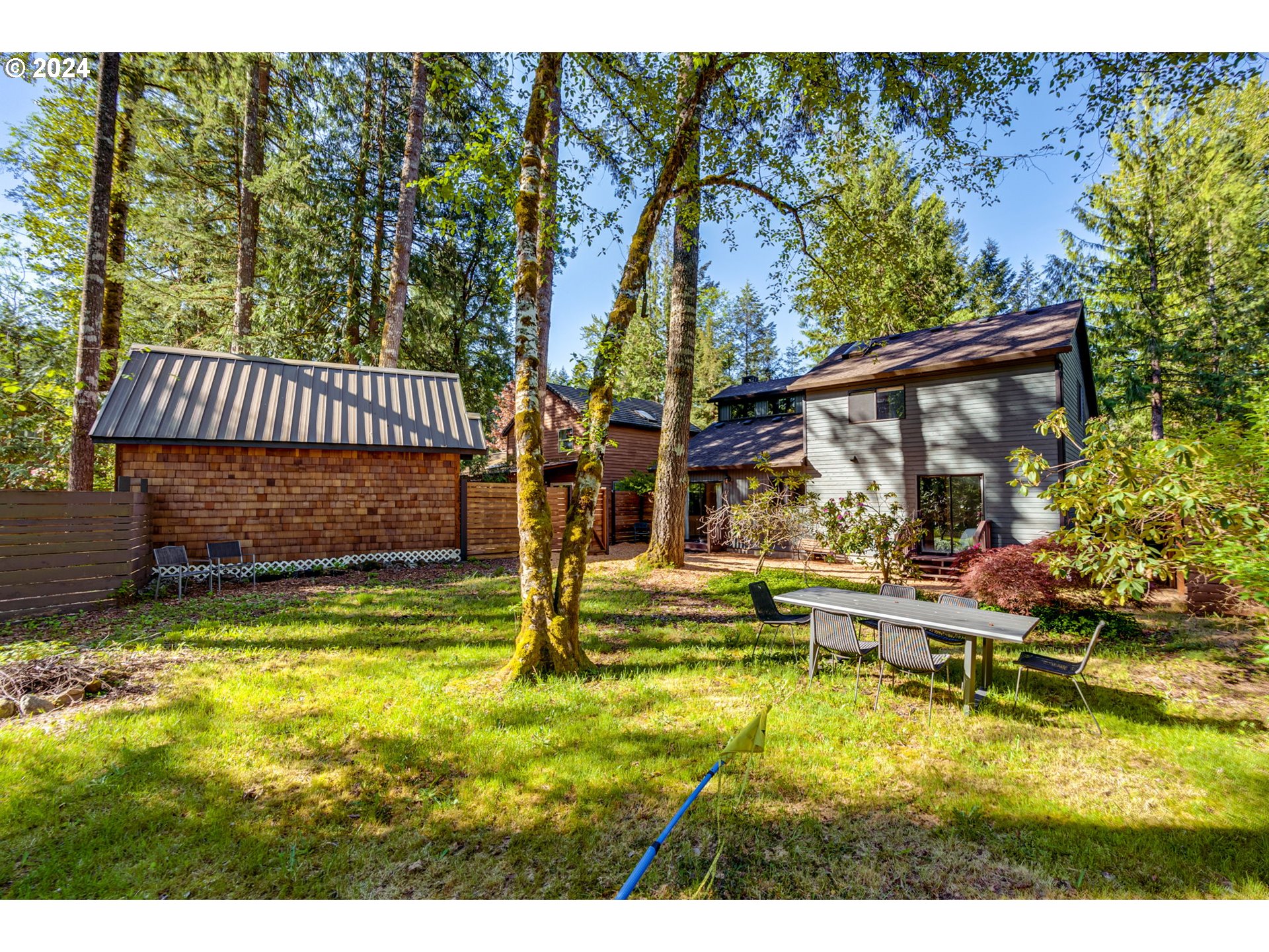 65377 East Sandy River Lane Rhododendron, OR 97049 - Photo 34 of 40 a view of swimming pool with lawn chairs and plants