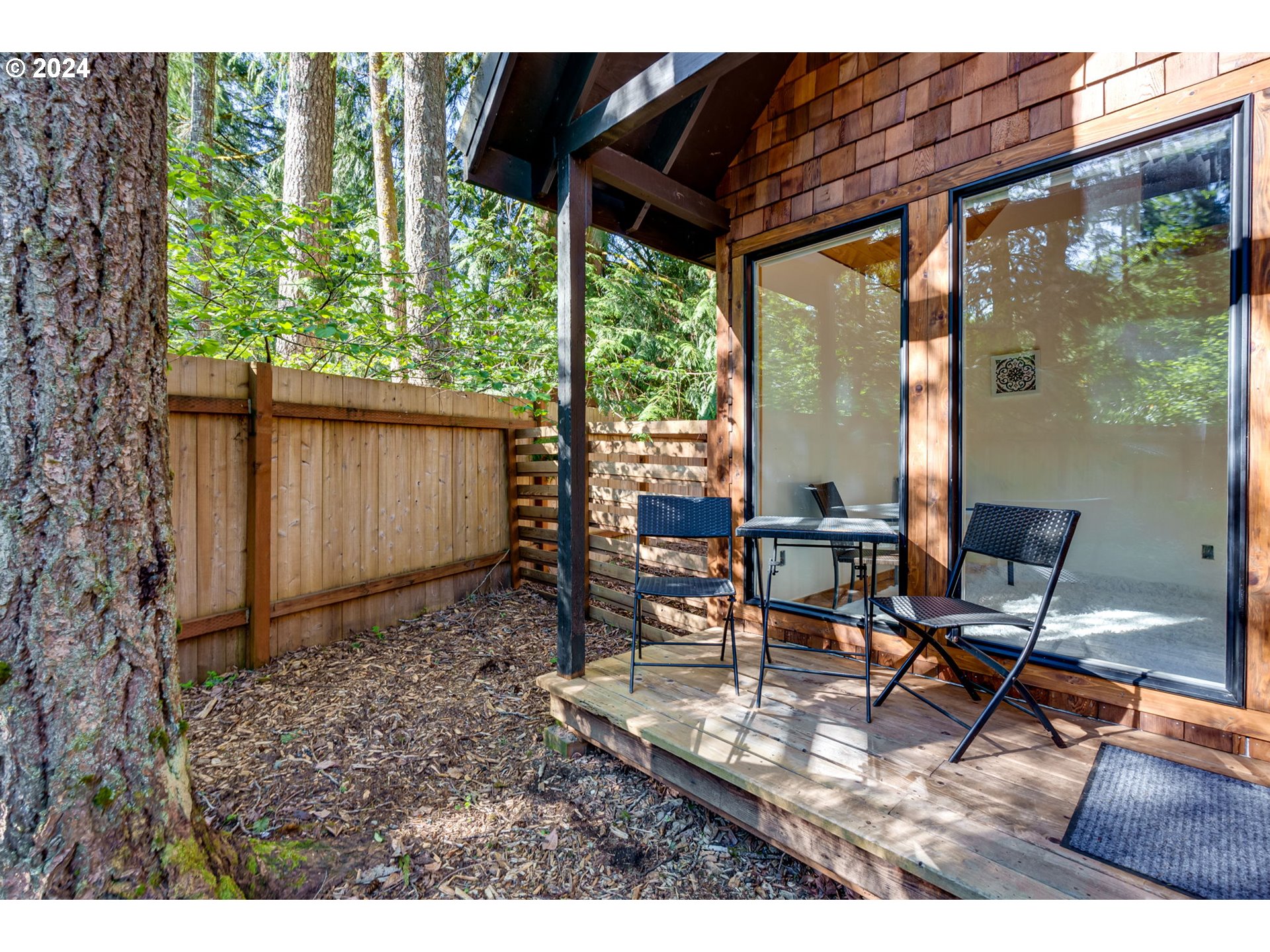 65377 East Sandy River Lane Rhododendron, OR 97049 - Photo 38 of 40 a building outdoor space with patio lots of furniture