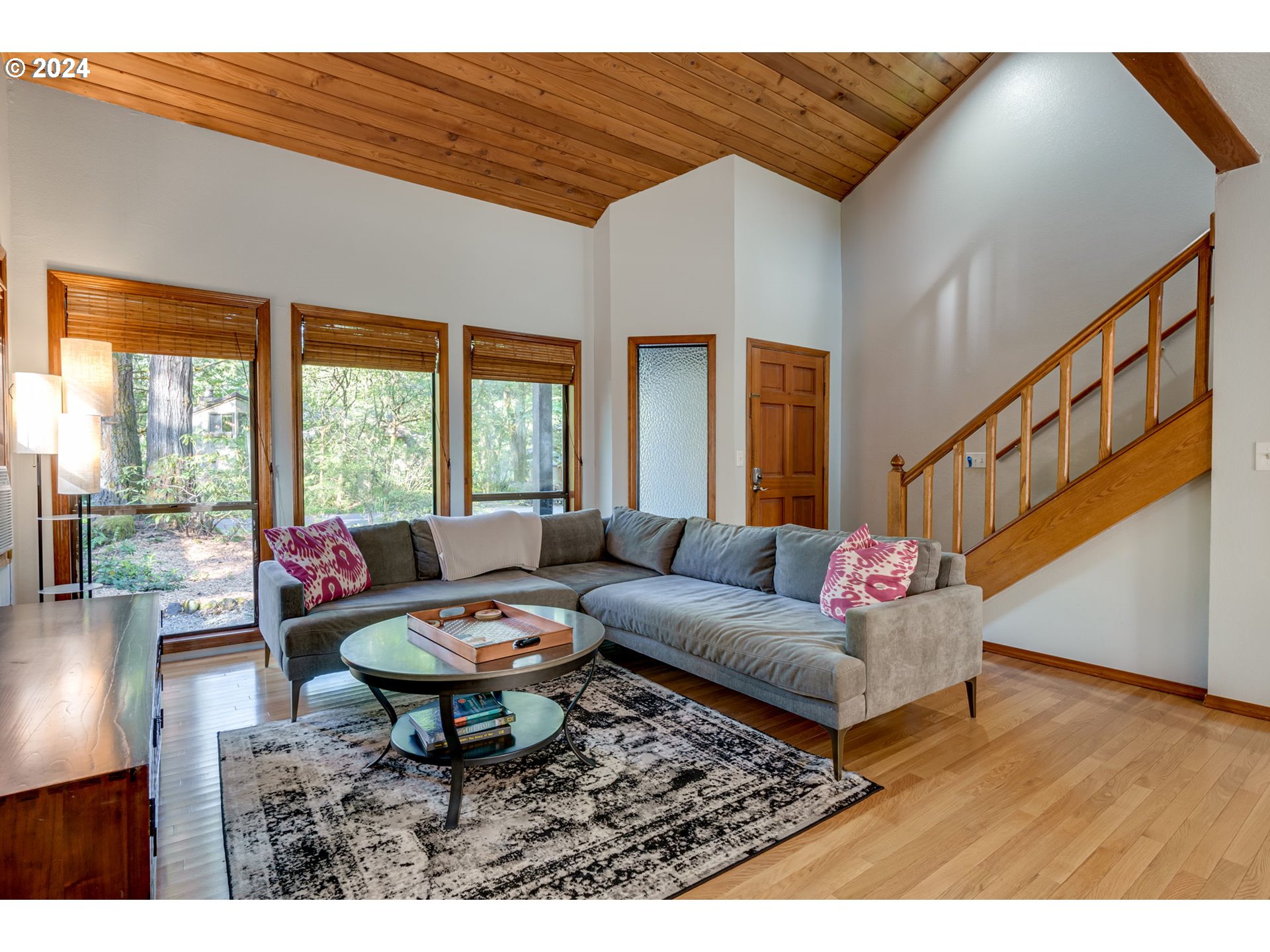 65377 East Sandy River Lane Rhododendron, OR 97049 - Photo 5 of 40 a living room with furniture and a large window