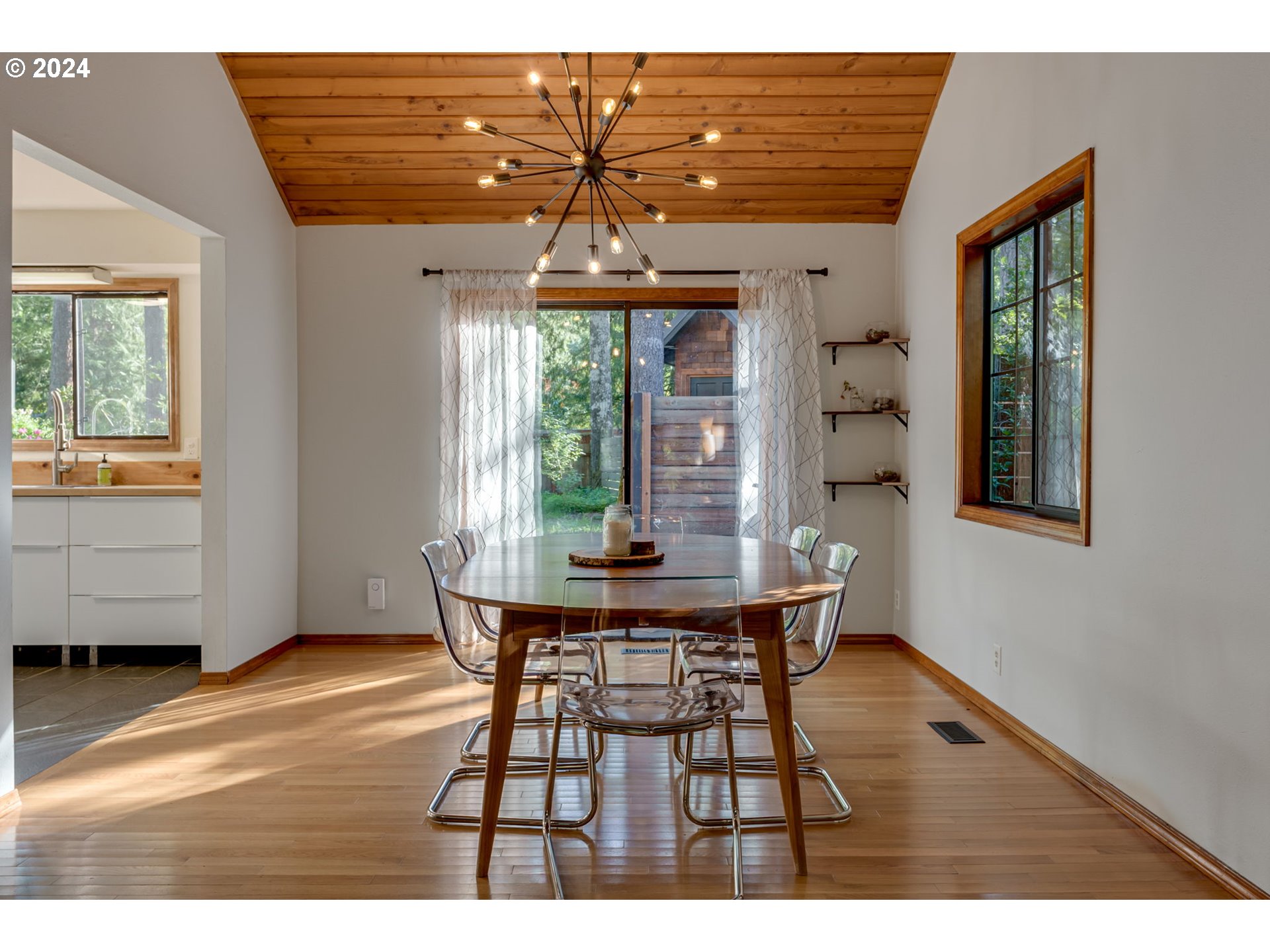 65377 East Sandy River Lane Rhododendron, OR 97049 - Photo 6 of 40 a dining room with furniture and window
