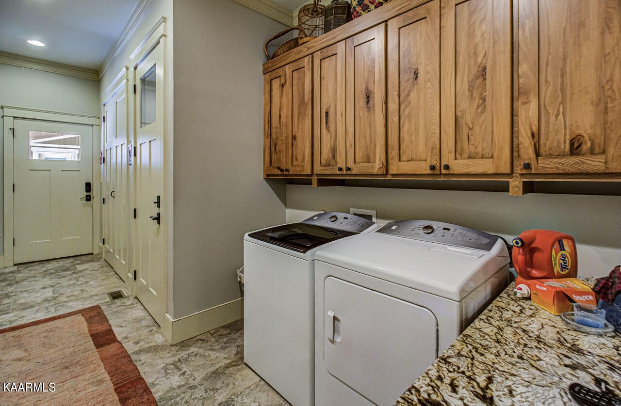 215 Estes Road Loudon, TN 37774 - Photo 25 of 59 a utility room with dryer and washer