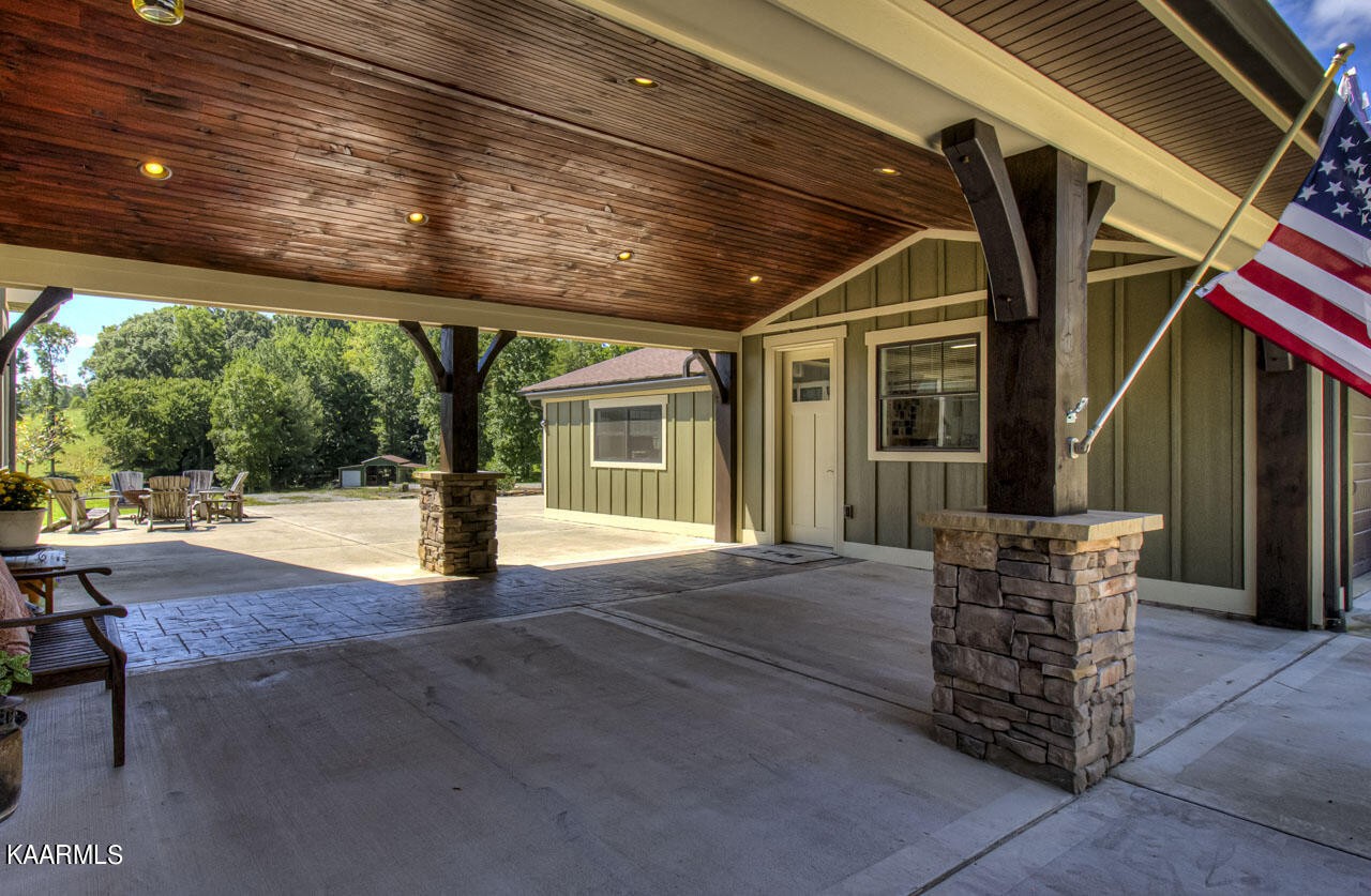 215 Estes Road Loudon, TN 37774 - Photo 42 of 59 a view of a porch with furniture and a yard
