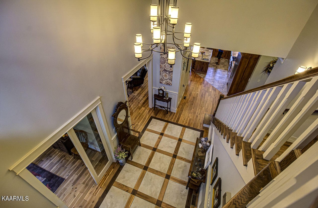 215 Estes Road Loudon, TN 37774 - Photo 5 of 59 a view of stairs and hall with wooden floor