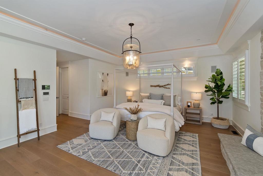 27567 West Shore Road Lake Arrowhead, CA 92352 - Photo 28 of 62 a living room with furniture a chandelier and a rug